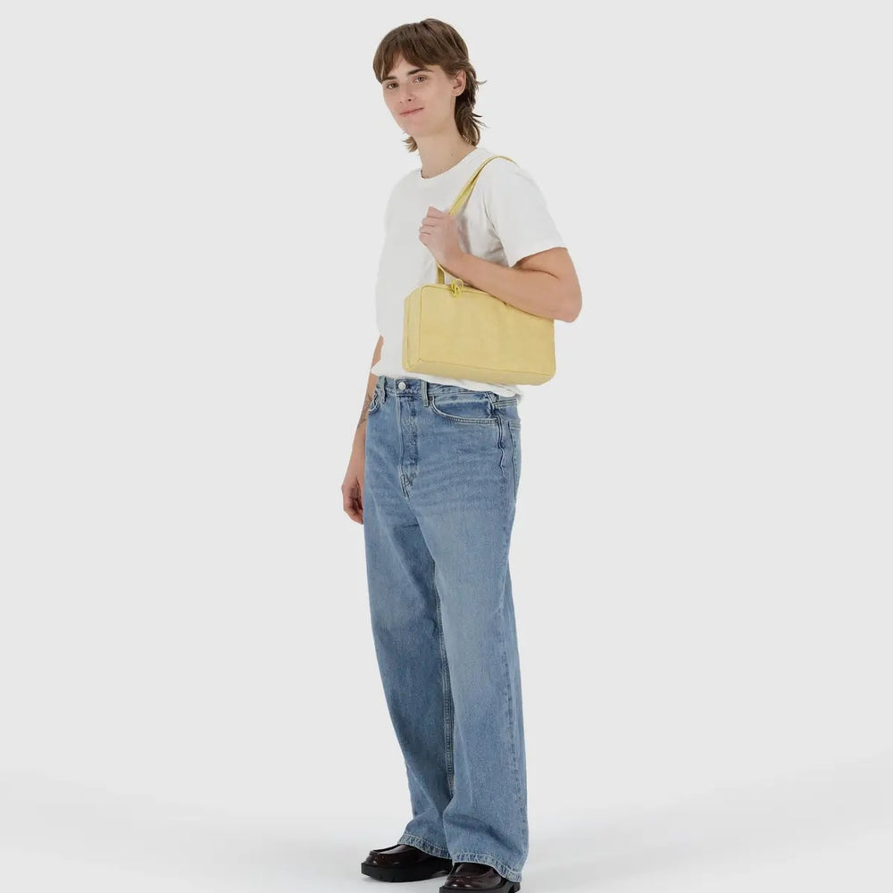 
                      
                        Small Nylon Bowler Bag - Butter
                      
                    
