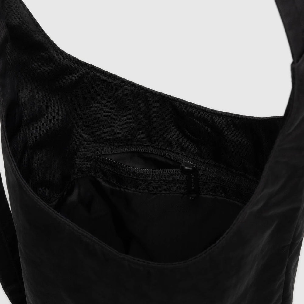 
                      
                        Small Nylon Sling Bag - Black
                      
                    