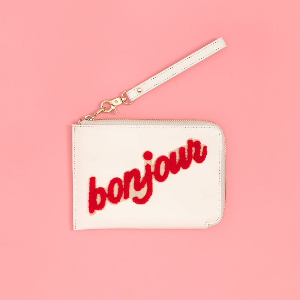 
                      
                        The Getaway Travel Clutch - Bonjour
                      
                    