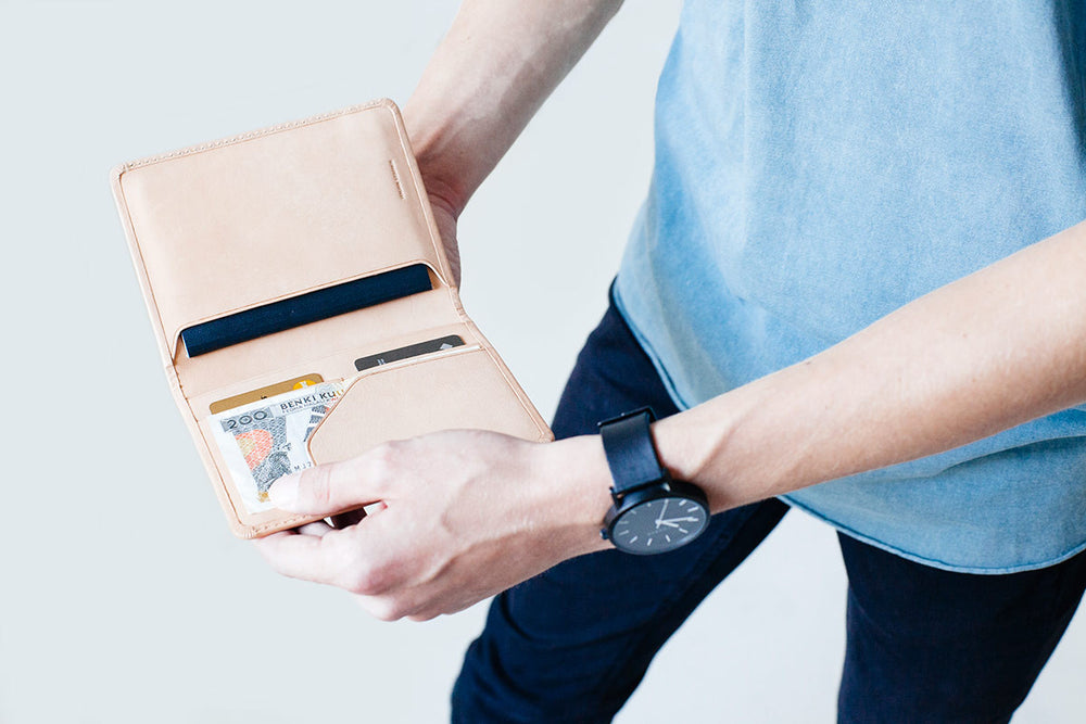 
                      
                        Conquest Passport Holder - Tan
                      
                    