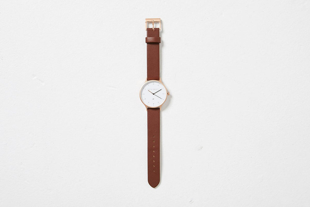 
                      
                        Inertia - Matte Black / White Face / Tan Strap
                      
                    