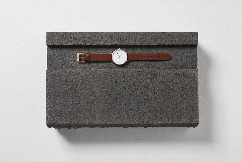 
                      
                        Inertia - Matte Black / White Face / Tan Strap
                      
                    