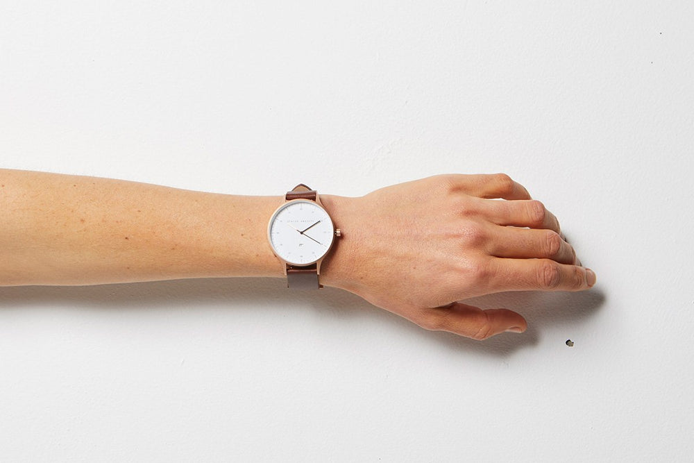
                      
                        Inertia - Matte Black / White Face / Tan Strap
                      
                    