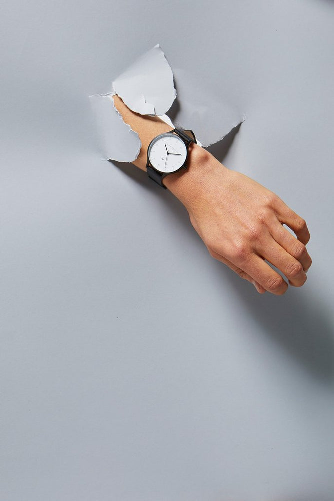 
                      
                        Inertia - Matte Black / White Face / Black Strap
                      
                    