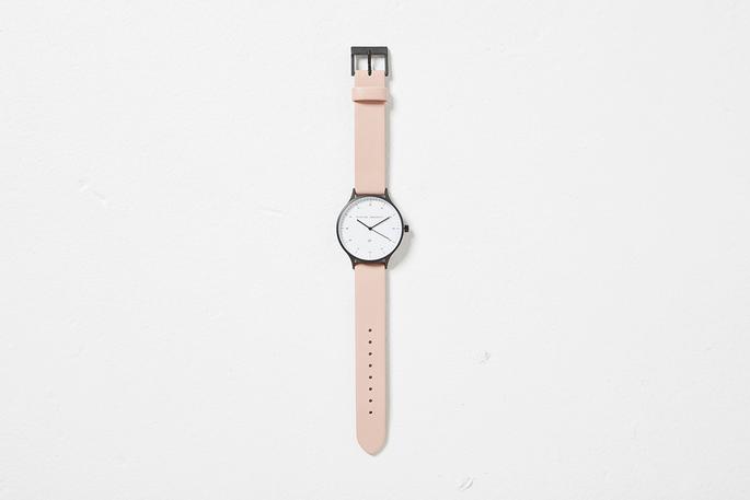 
                      
                        Inertia - Matte Black / White Face / Blush Strap
                      
                    
