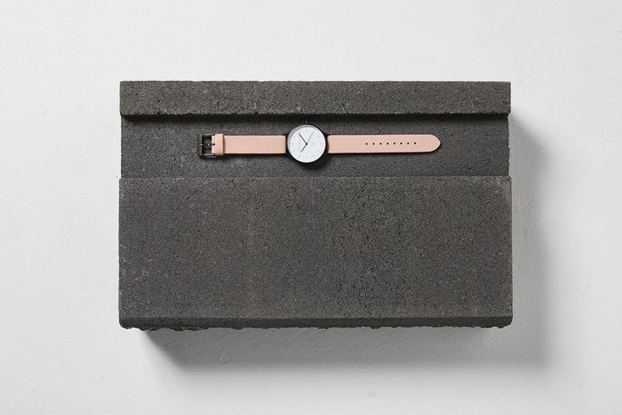 
                      
                        Inertia - Matte Black / White Face / Blush Strap
                      
                    