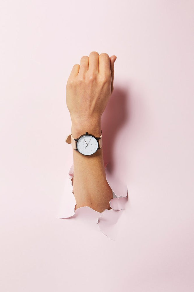 
                      
                        Inertia - Matte Black / White Face / Blush Strap
                      
                    