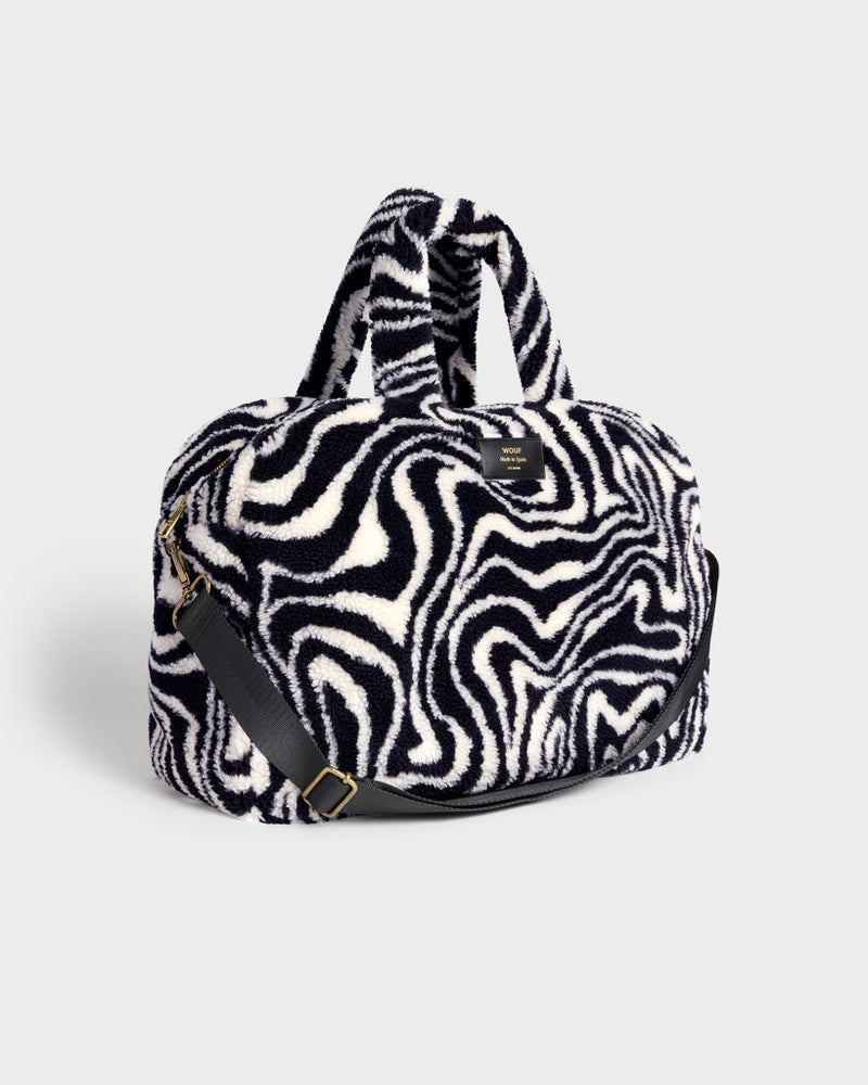 
                      
                        Teddy's Capsule Weekend Bag - Hypnotic
                      
                    